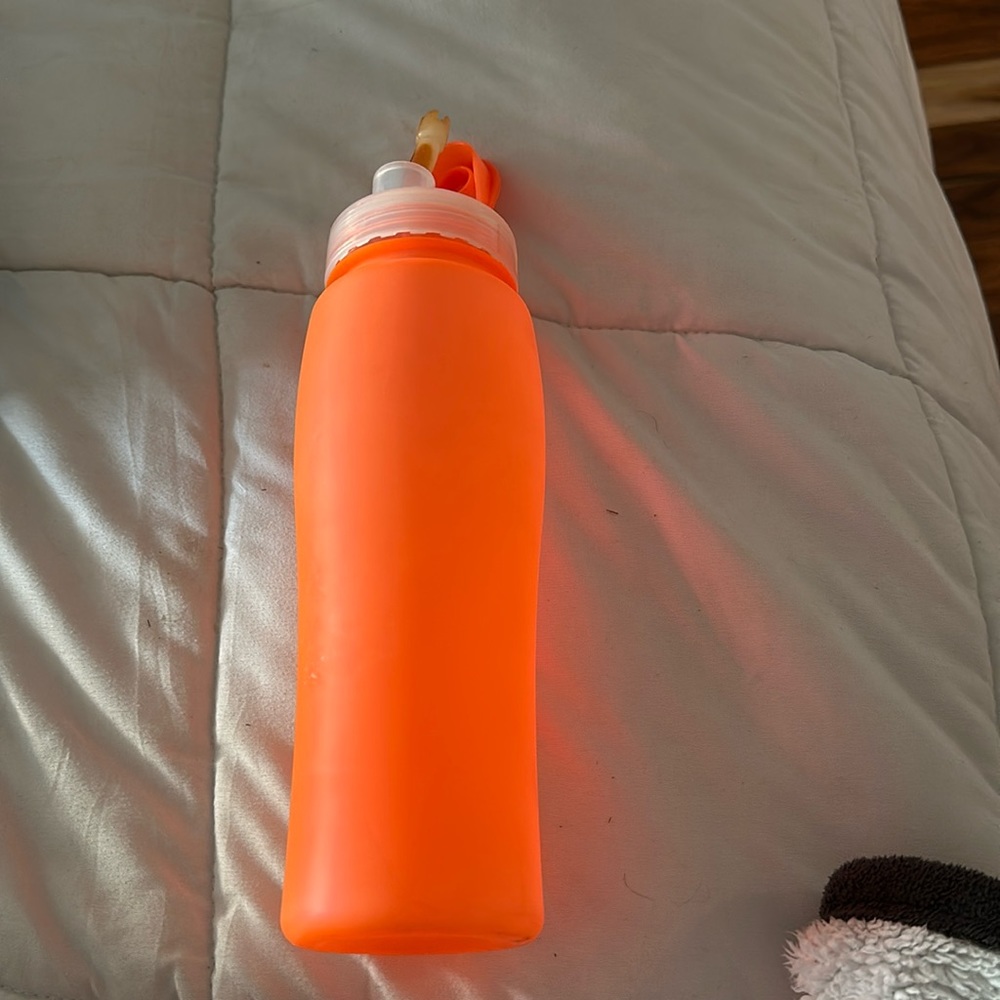 Pink neon water bottle.